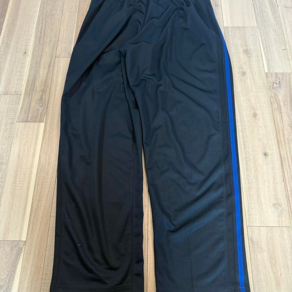 2000s baggy Nike black track pants with blue stripe sz XL
